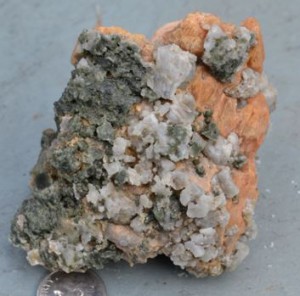 Diopside, orange calcite and and white albite from a new location behind the radio tower.