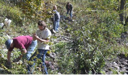 From left to right: Ken, Craig, Sue, and Linda collecting hexagonite, but hopefully not poison ivy, along the Oswegatchie River near Talcville.