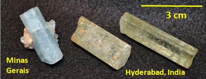 Note the effect of Fe+3 in the color of the pair of aquamarine from India.  (Fred Haynes collection)