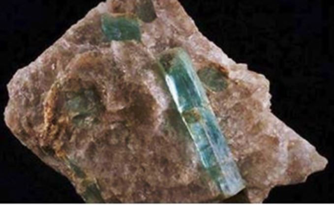 This gemmy 5 cm aquamarine on pegmatite matrix is from the Reynolds Mine in Worcester Co., MA and was probably recovered over 100 years ago.  It recently appeared on the Central Massachusetts Fossil and Mineral Club Facebook page from the collection of L. Vanuxem. 