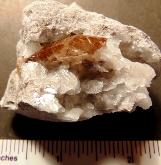 One of the better topaz we collected resting in a vug within rhyolite and accompanied by calcite.