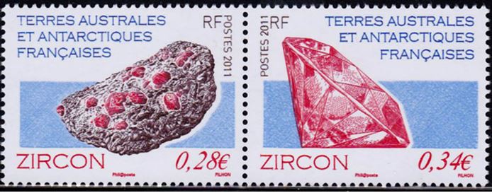 This pair of 2011 stamps from the French Southern and Anarctive Territory demonstrate the natural occurrence of zircons embedded in host granite (left)  and a cut gemstone (right). 